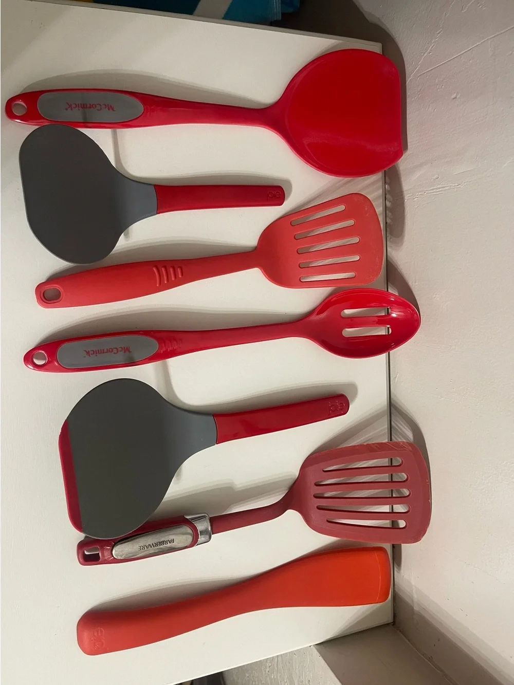 Bundle of Seven Red Silicone Kitchen Utensils